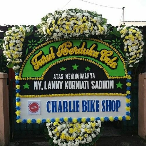 Papan Bunga Turut Berduka Cita